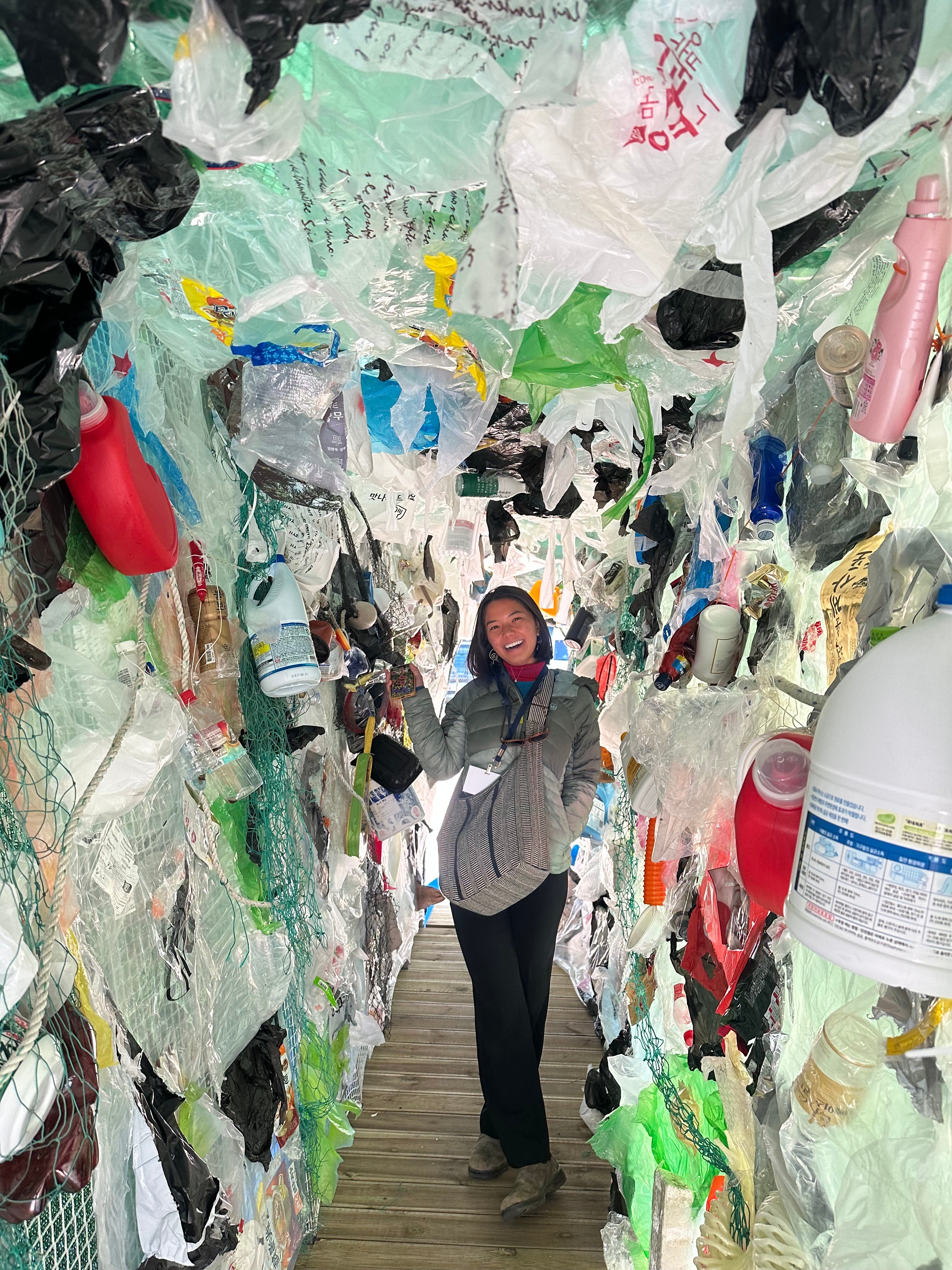 Student surrounded by plastic