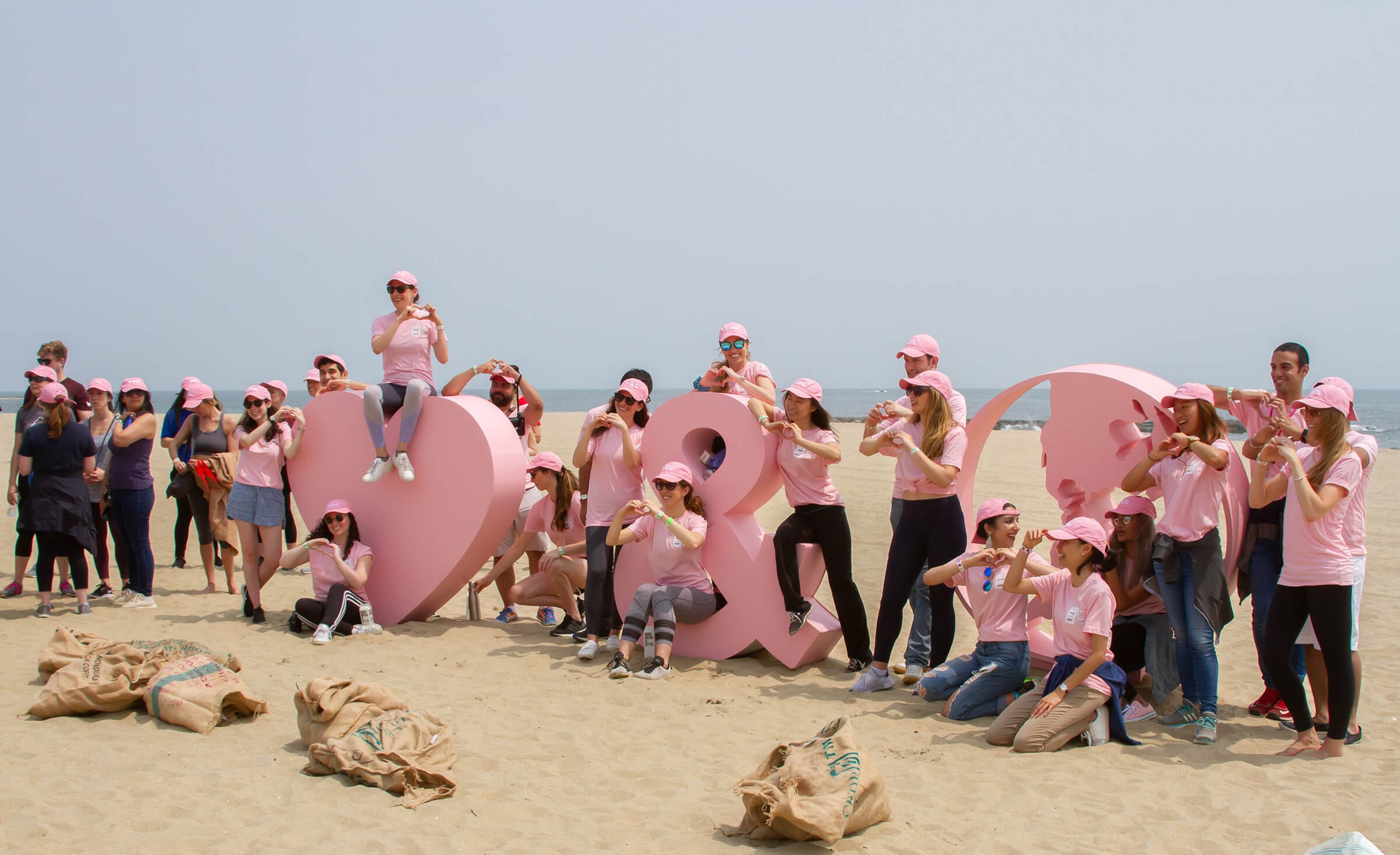 A group of Surfrider partners on the beach